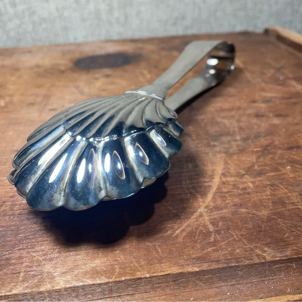 Vintage Silver plated Shell serving tongs